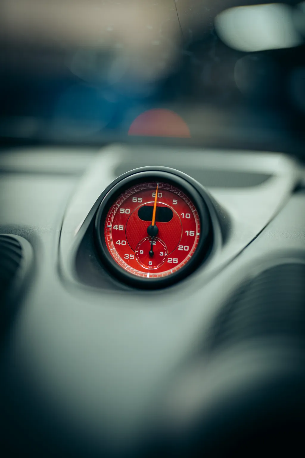 Close-up of the Porsche Sport Chrono dashboard clock